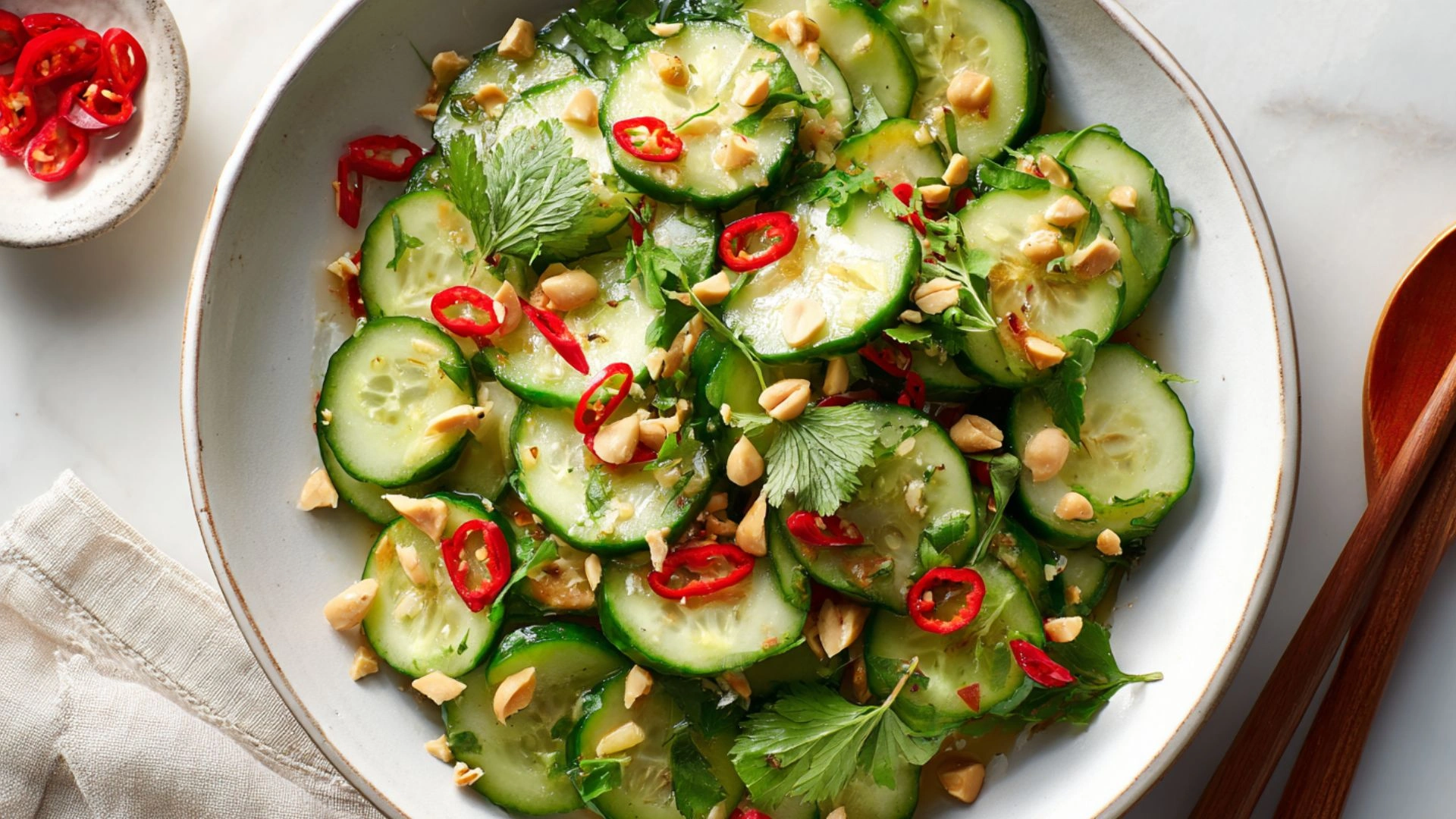 Modern Thai cucumber salad with chili, lime, and peanuts