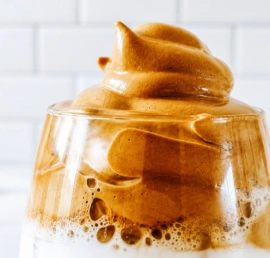 Dalgona coffee with whipped coffee foam and milk