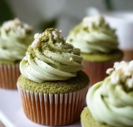 Delicious fluffy matcha cupcakes topped with green tea frosting
