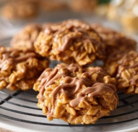 Plate of delicious peanut butter no-bake cookies topped with chocolate
