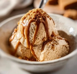 Creamy gingerbread nice cream served in a bowl, perfect winter dessert.