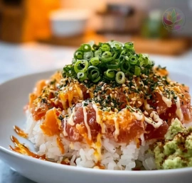 Delicious spicy tuna rice bowl topped with fresh ingredients and vibrant colors