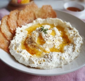 Whipped feta dip served with fresh vegetables and pita chips