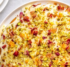 Deliciously moist Persian Love Cake with cardamom, rose water, and pistachios.