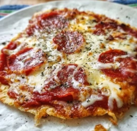Air fried pepperoni pizza cooked to perfection in an air fryer.