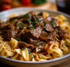 Slow Cooker Beef and Noodles served in a bowl, perfect for comfort food lovers.